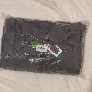 Bench woman’s grey puffer jacket